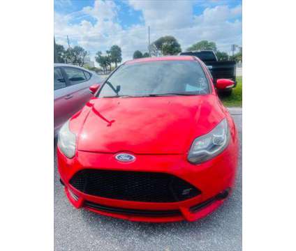 2013 Ford Focus ST 4dr Hatchback is a Red 2013 Ford Focus ST Car for Sale in Fort Lauderdale FL