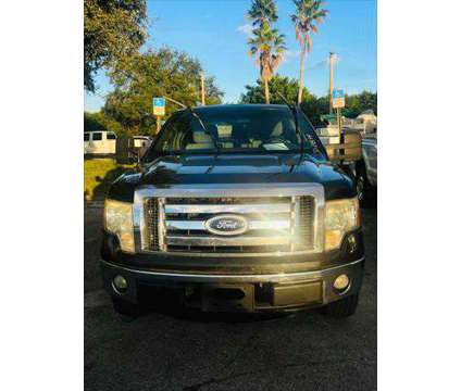 2011 Ford F-150 XLT is a Black 2011 Ford F-150 XLT Truck in Fort Lauderdale FL