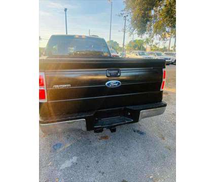 2011 Ford F-150 XLT is a Black 2011 Ford F-150 XLT Truck in Fort Lauderdale FL