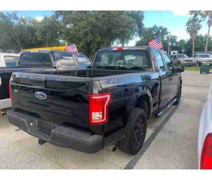 2015 Ford F-150 XLT is a Black 2015 Ford F-150 XLT Truck in Fort Lauderdale FL