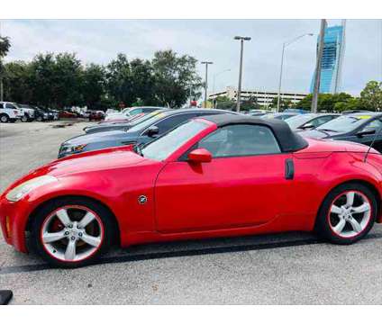 2006 Nissan 350Z Touring is a Red 2006 Nissan 350Z Touring Car for Sale in Fort Lauderdale FL