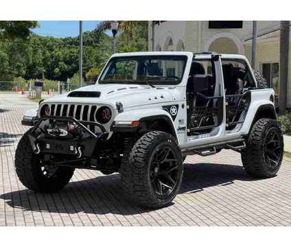2023 Jeep Wrangler Unlimited for sale is a White 2023 Jeep Wrangler Unlimited Car for Sale in Tampa FL