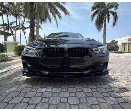 2014 BMW 3 Series for sale is a Black 2014 BMW 3-Series Hatchback in Oakland Park FL