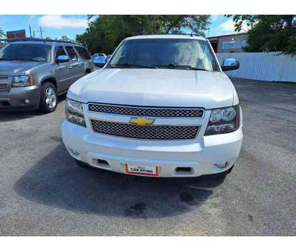 2013 Chevrolet Tahoe for sale is a White 2013 Chevrolet Tahoe 1500 2dr Car for Sale in Conroe TX