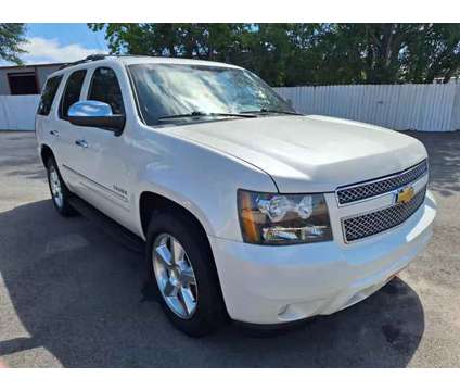2013 Chevrolet Tahoe for sale is a White 2013 Chevrolet Tahoe 1500 2dr Car for Sale in Conroe TX