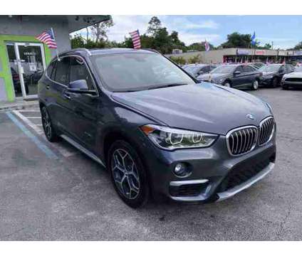2017 BMW X1 for sale is a Grey 2017 BMW X1 Car for Sale in Davie FL
