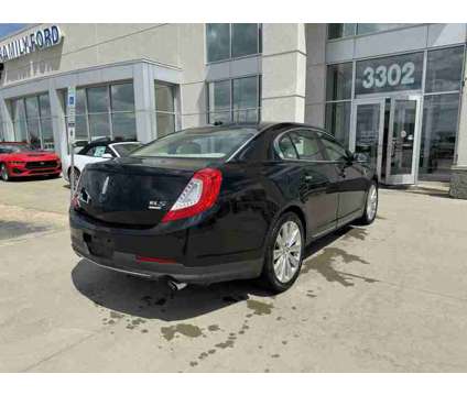2013UsedLincolnUsedMKS is a Black 2013 Lincoln MKS Car for Sale in Fargo ND