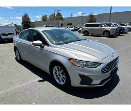 2019UsedFordUsedFusion is a Silver 2019 Ford Fusion Car for Sale in Sanford FL