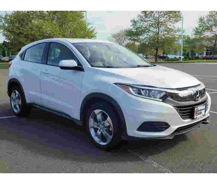 2021UsedHondaUsedHR-V is a Silver, White 2021 Honda HR-V Car for Sale in Westbrook CT