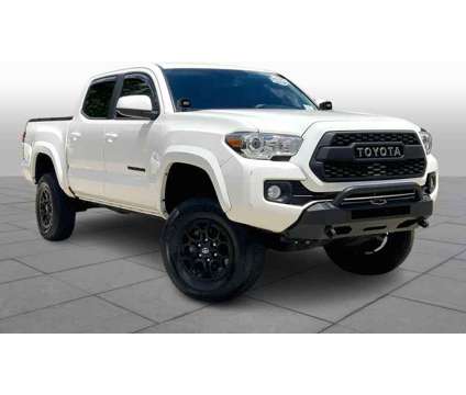 2021UsedToyotaUsedTacoma is a White 2021 Toyota Tacoma Car for Sale
