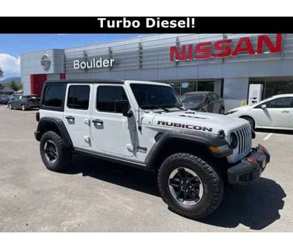 2021 Jeep Wrangler Unlimited Rubicon is a White 2021 Jeep Wrangler Unlimited Car for Sale in Boulder CO