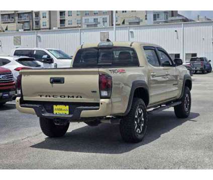 2018 Toyota Tacoma TRD Off Road is a Brown 2018 Toyota Tacoma TRD Off Road Car for Sale in Houston TX