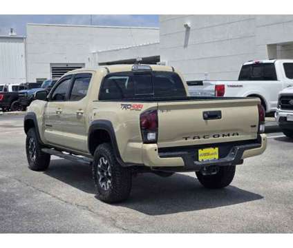 2018 Toyota Tacoma TRD Off Road is a Brown 2018 Toyota Tacoma TRD Off Road Car for Sale in Houston TX