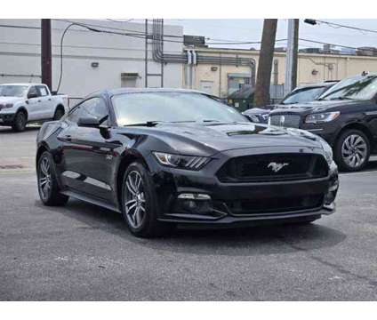 2016 Ford Mustang GT is a Black 2016 Ford Mustang GT Car for Sale in Houston TX