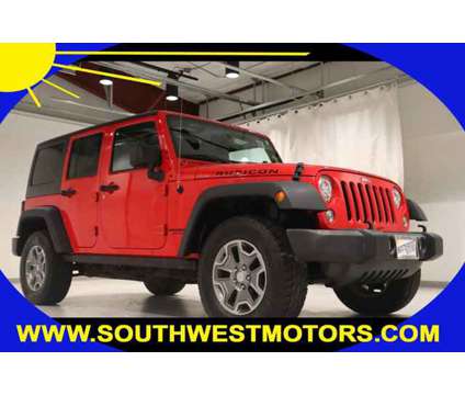 2017 Jeep Wrangler Unlimited Rubicon is a Red 2017 Jeep Wrangler Unlimited Rubicon Car for Sale in Pueblo CO