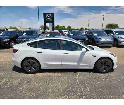 2021 Tesla Model 3 Standard Range Plus is a White 2021 Tesla Model 3 Car for Sale in Lubbock TX