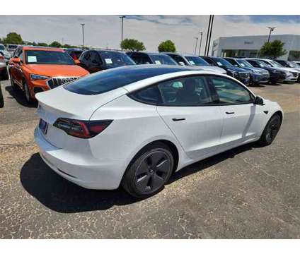 2021 Tesla Model 3 Standard Range Plus is a White 2021 Tesla Model 3 Car for Sale in Lubbock TX
