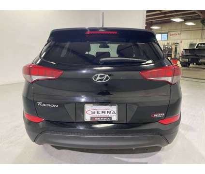 2018 Hyundai Tucson SE is a Black 2018 Hyundai Tucson SE Car for Sale in Traverse City MI
