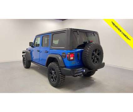 2022 Jeep Wrangler Unlimited Willys is a Blue 2022 Jeep Wrangler Unlimited SUV in Holland MI