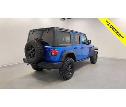 2022 Jeep Wrangler Unlimited Willys is a Blue 2022 Jeep Wrangler Unlimited SUV in Holland MI