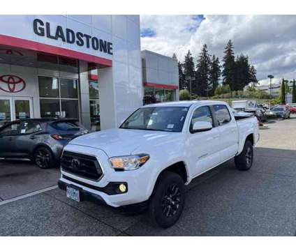 2021 Toyota Tacoma V6 is a White 2021 Toyota Tacoma Car for Sale in Gladstone OR