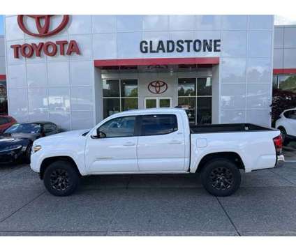 2021 Toyota Tacoma V6 is a White 2021 Toyota Tacoma Car for Sale in Gladstone OR