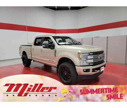 2017 Ford F-250SD Platinum is a Gold, White 2017 Ford F-250 Platinum Truck in Saint Cloud MN