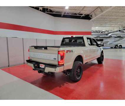 2017 Ford F-250SD Platinum is a Gold, White 2017 Ford F-250 Platinum Truck in Saint Cloud MN