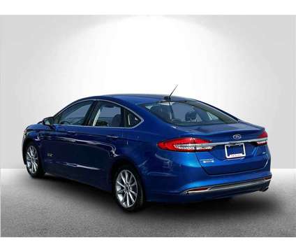 2017 Ford Fusion Energi SE Luxury is a Blue 2017 Ford Fusion Energi SE Luxury Sedan in Clinton Township MI