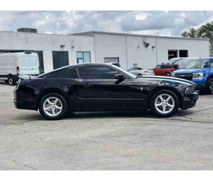 2014 Ford Mustang V6 Premium is a Black 2014 Ford Mustang V6 Premium Coupe in Manteno IL