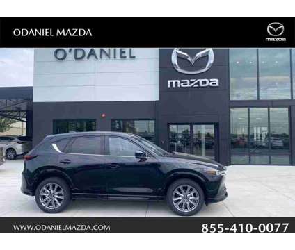 2024 Mazda CX-5 2.5 S Premium Package is a Black 2024 Mazda CX-5 SUV in Fort Wayne IN