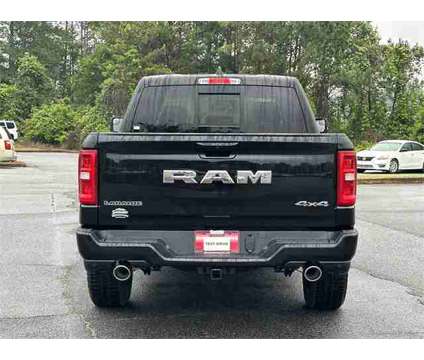 2025 Ram 1500 Laramie is a Black 2025 RAM 1500 Model Laramie Truck in Canton GA