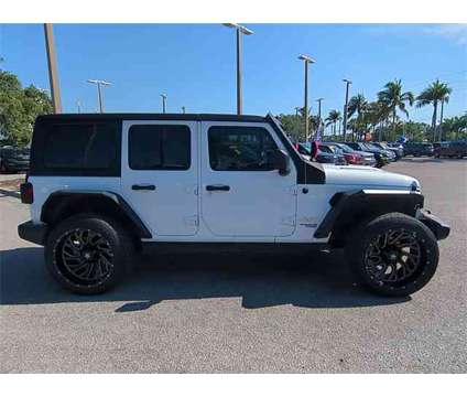 2021 Jeep Wrangler Unlimited Sport S is a White 2021 Jeep Wrangler Unlimited SUV in Naples FL