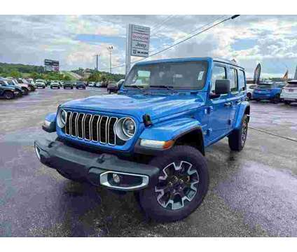 2024 Jeep Wrangler Sahara is a Blue 2024 Jeep Wrangler Sahara SUV in Branson MO