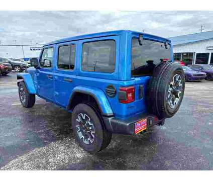 2024 Jeep Wrangler Sahara is a Blue 2024 Jeep Wrangler Sahara SUV in Branson MO