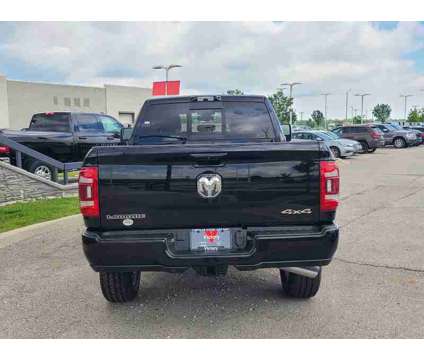 2024 Ram 2500 Laramie is a Black 2024 RAM 2500 Model Laramie Truck in Kansas City KS