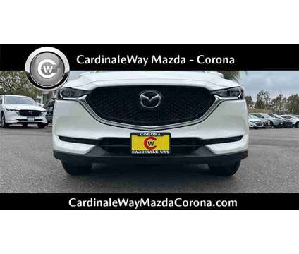 2021 Mazda CX-5 Sport is a White 2021 Mazda CX-5 Sport SUV in Corona CA