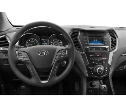 2018 Hyundai Santa Fe Sport 2.4L is a Black 2018 Hyundai Santa Fe Sport 2.4L SUV in Mattoon IL