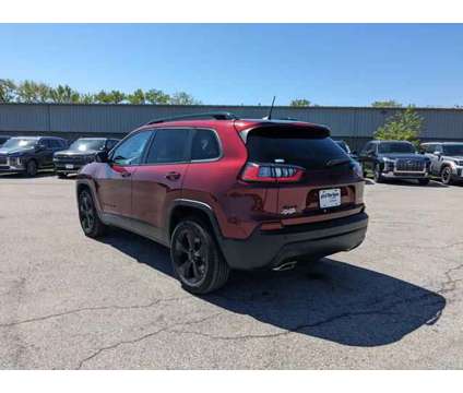 2019 Jeep Cherokee Altitude 4x4 is a Red 2019 Jeep Cherokee Altitude SUV in Clive IA