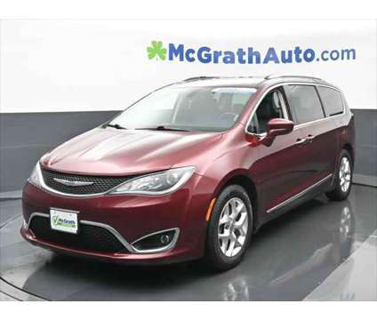 2020 Chrysler Pacifica Touring L Plus is a Red 2020 Chrysler Pacifica Touring Van in Dubuque IA