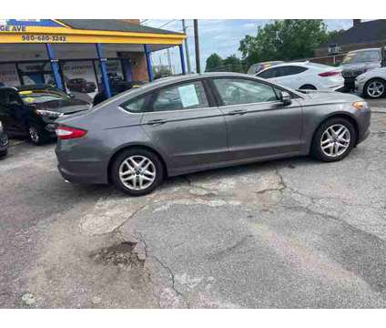 2014 Ford Fusion for sale is a Grey 2014 Ford Fusion Car for Sale in Kannapolis NC