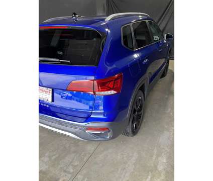 2024UsedVolkswagenUsedTaosUsedFWD is a Blue 2024 Car for Sale in Brunswick OH