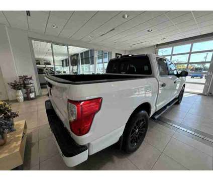 2019UsedNissanUsedTitan is a White 2019 Nissan Titan Car for Sale in Milwaukee WI