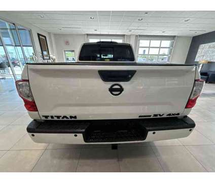 2019UsedNissanUsedTitan is a White 2019 Nissan Titan Car for Sale in Milwaukee WI