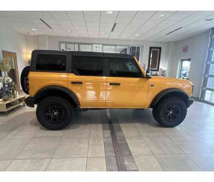 2022UsedFordUsedBronco is a Orange 2022 Ford Bronco Car for Sale in Milwaukee WI