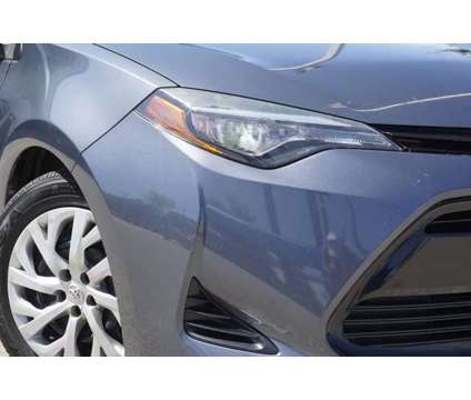 2017 Toyota Corolla is a Blue 2017 Toyota Corolla Car for Sale in San Antonio TX
