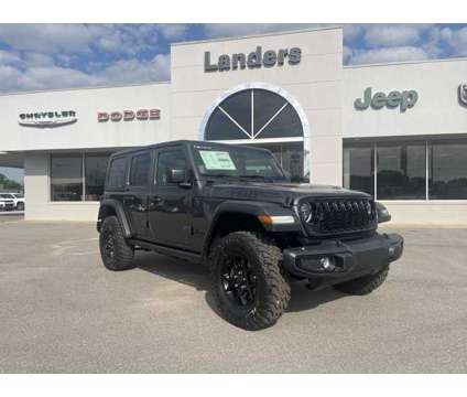 2024 Jeep Wrangler Willys is a Grey 2024 Jeep Wrangler Car for Sale in Covington TN