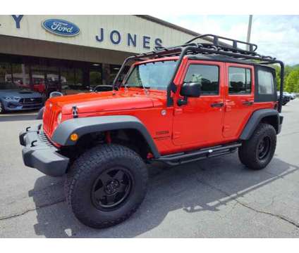 2015 Jeep Wrangler Unlimited Sport is a Red 2015 Jeep Wrangler Unlimited Sport Car for Sale in Hayesville NC