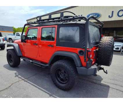 2015 Jeep Wrangler Unlimited Sport is a Red 2015 Jeep Wrangler Unlimited Sport Car for Sale in Hayesville NC