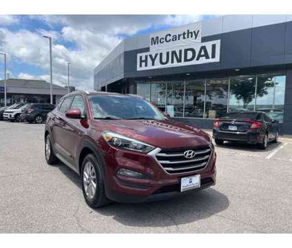 2017 Hyundai Tucson SE is a Red 2017 Hyundai Tucson SE Car for Sale in Olathe KS